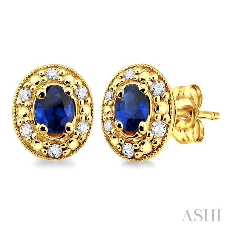 4x3 MM Oval Shaped Sapphire and 1/10 Ctw Single Cut Diamond Earrings in 14K Yellow Gold