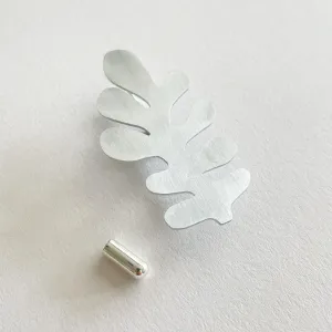 Pin Brooch in silver aluminium by Tom Pigeon