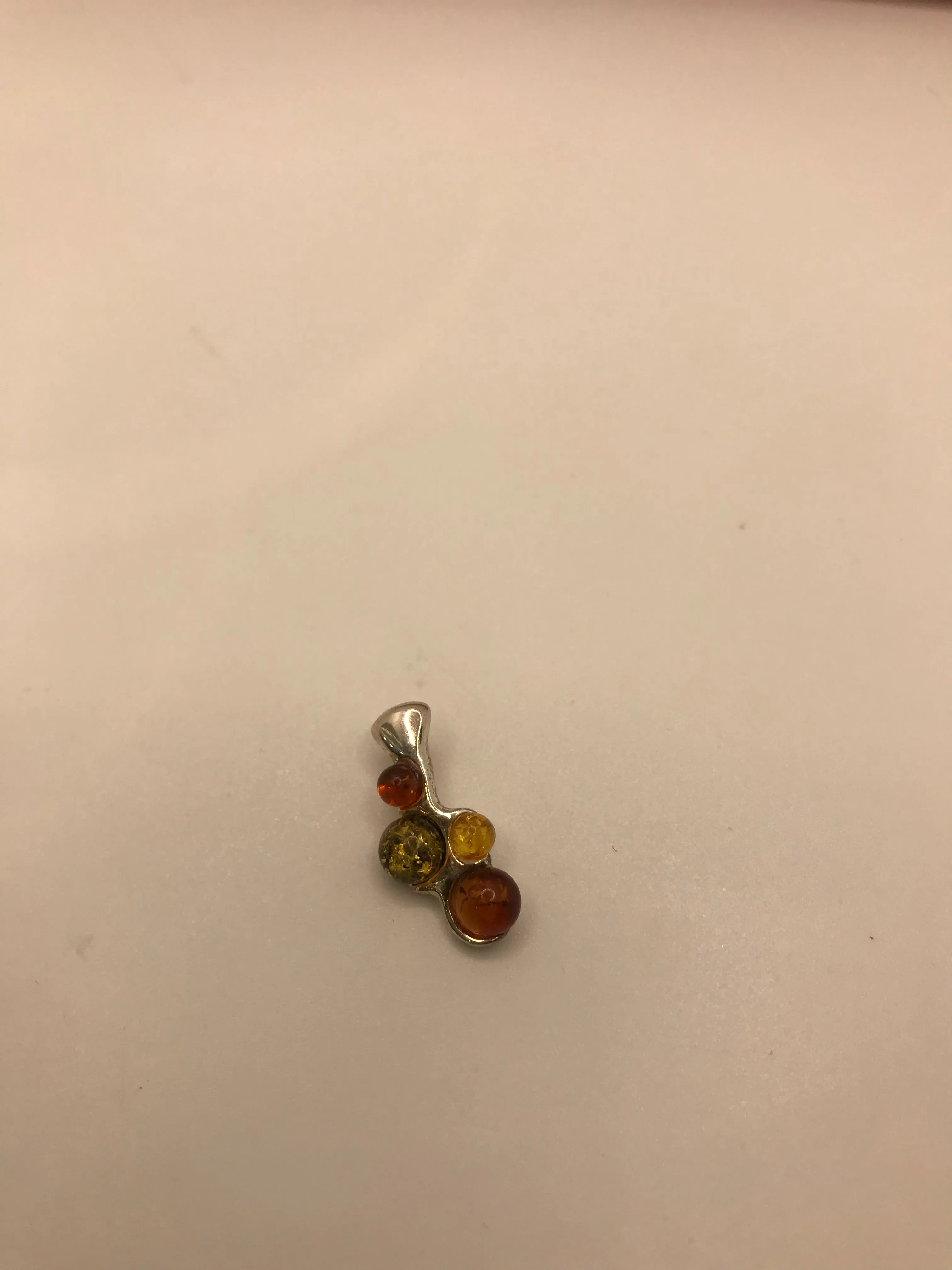 Sterling silver amber pendants