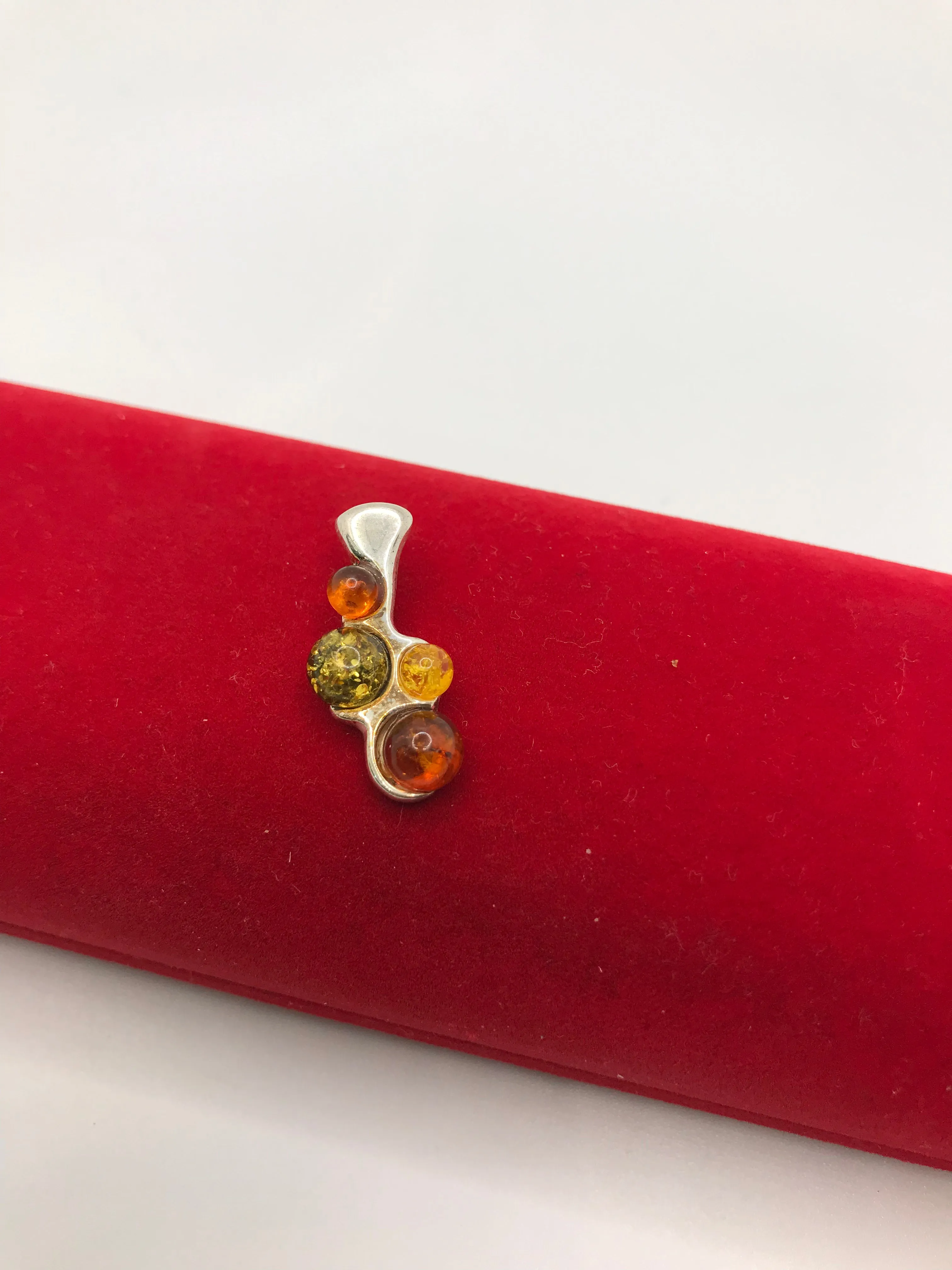 Sterling silver amber pendants